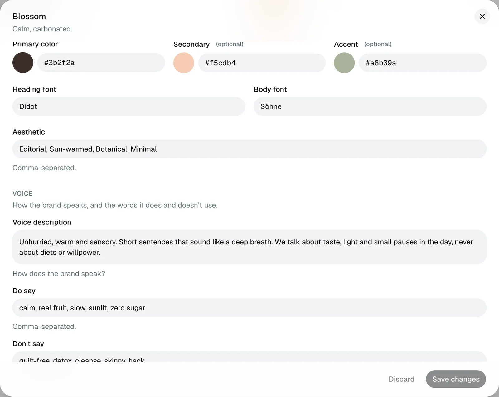 The brand editor's Voice section: a voice description, a Do say list and a Don't say list, below the brand colors and fonts.