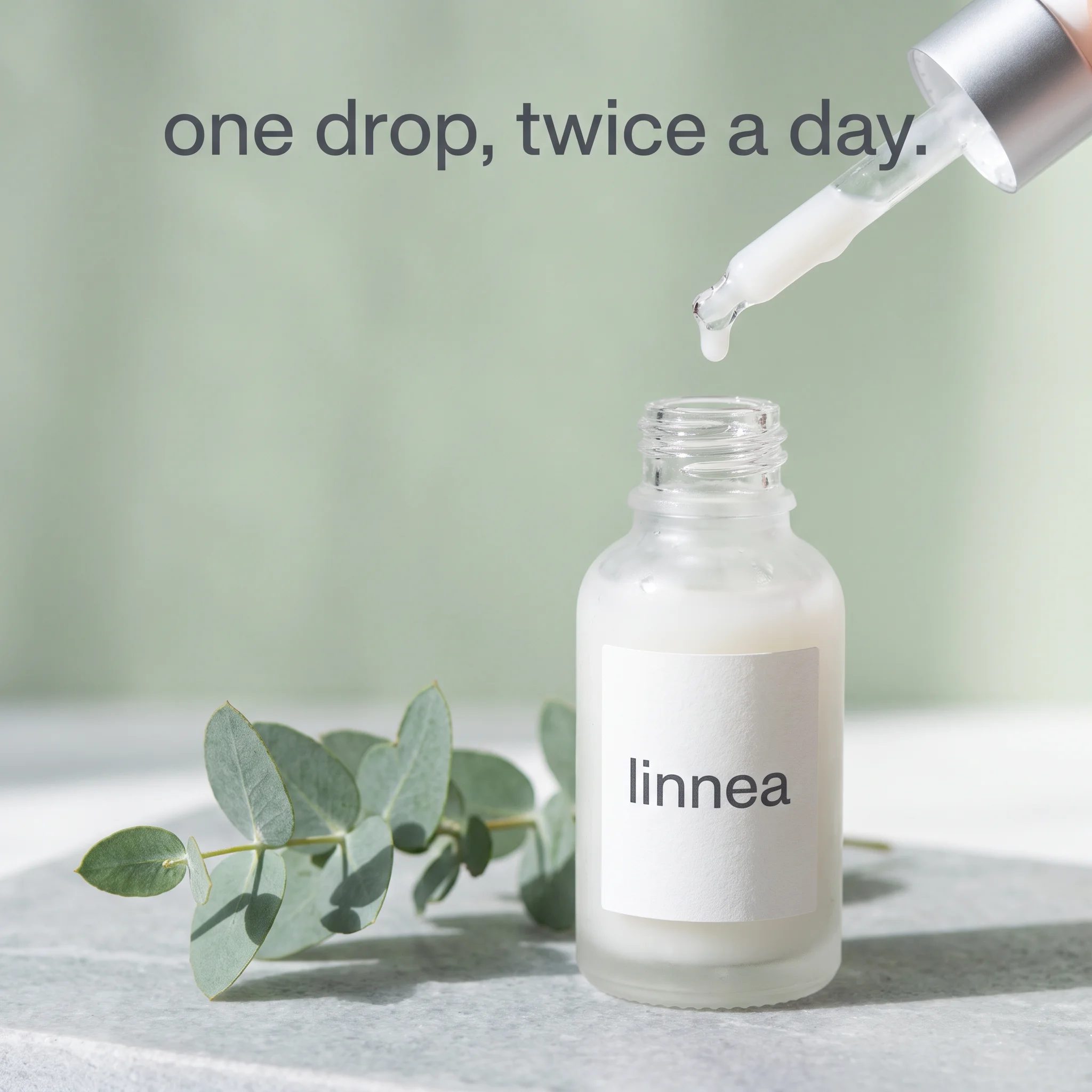 Example ad generated with Terrads: macro of a milky serum drop falling from a glass dropper into the Linnea bottle on pale sage, headline “one drop, twice a day.”